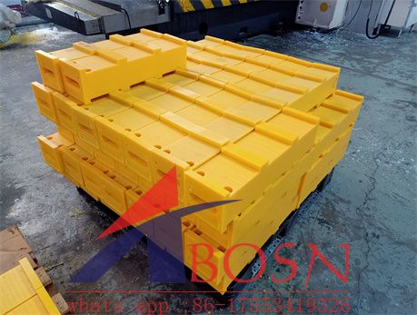 Yellow plastic rubber excavator track shoes